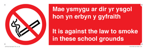Mae ysmygu ar dir yr ysgol hon yn erbyn y gyfraith It is against the law to smoke in these school grounds - Bilingual Welsh / English